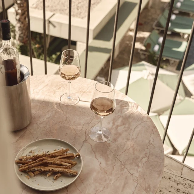 Introducing the Rosé Interlude Package. Your evening begins the way it should, with a crisp bottle of AIX Rosé, rosemary grissini and fresh figs. The perfect interlude before the night unfolds.