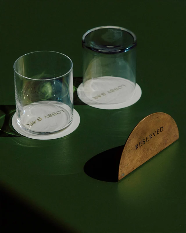 Your table is ready. What shall it be? A Sunburnt Margarita or Marigold Sour? Excellent choice, either way.